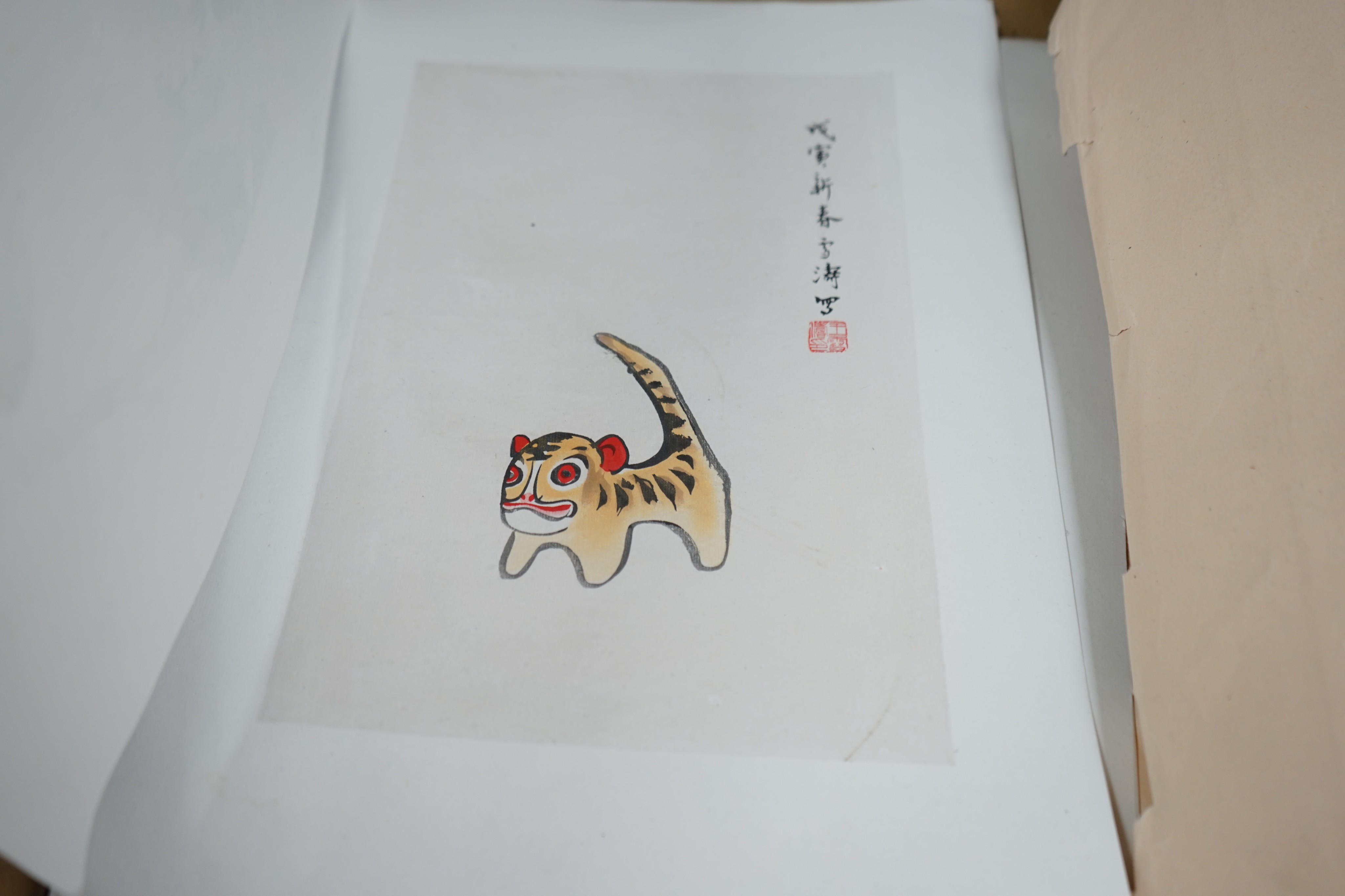 An album of Chinese prints, dated 1954 including Qi Baishi